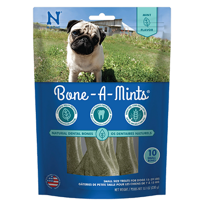Package of Bone-A-Mints dog treats with a pug on the grass
