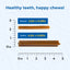 Comparison of regular and jumbo sizes of a chew product with a ruler on a blue background.