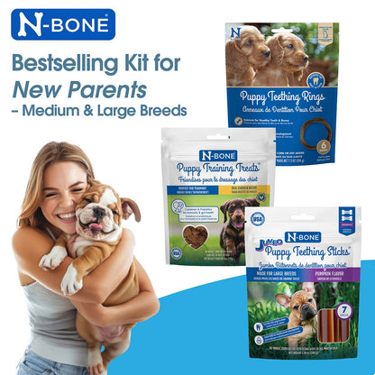 N-Bone puppy care product kit for new parents with a woman holding a dog.